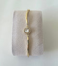 Gold Plated 14K – B006

Halo Charm Bangle