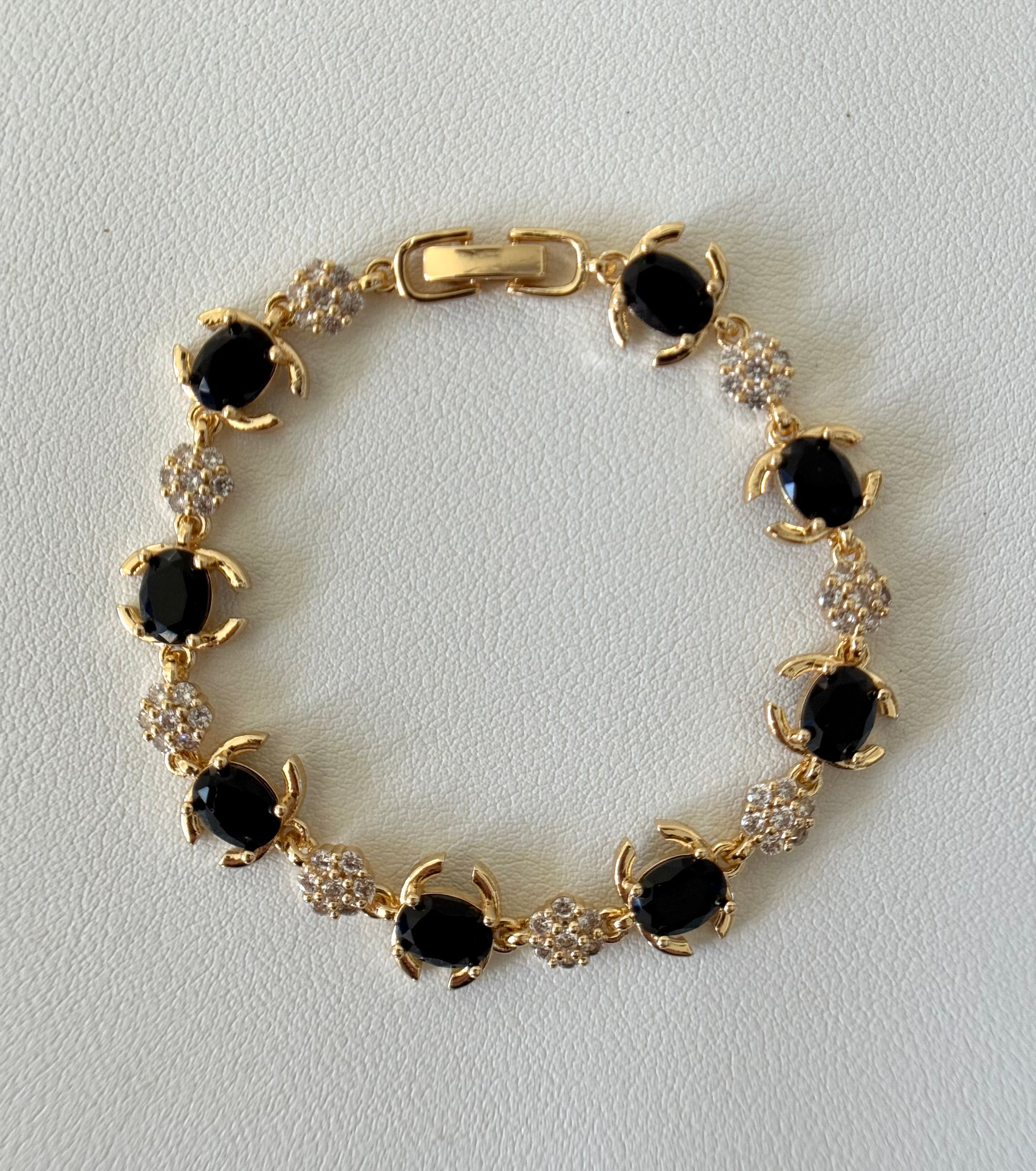 Gold Plated 14K – B005

Black Stone Petal Bracelet